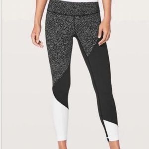 Lululemon Wunder Under polka dot white and black color block leggings.